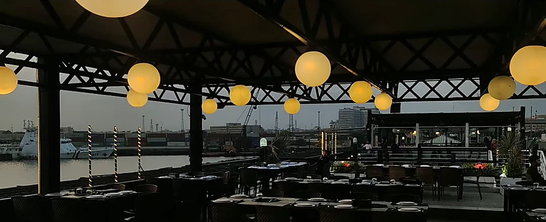 The covered deck at Port Grand, just after dusk.